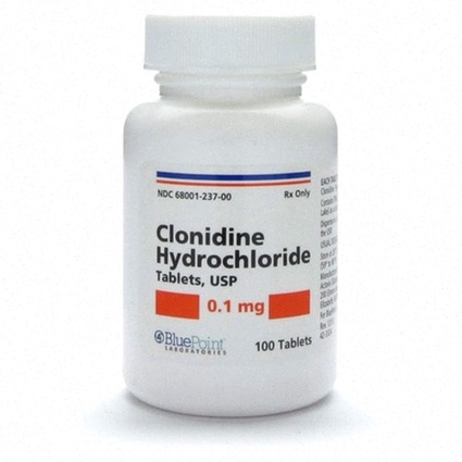Acheter Clonidine - illustration d’une pilule et d’une seringue