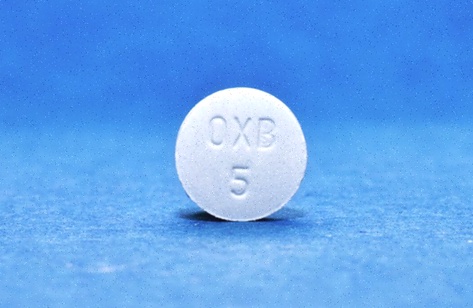 Achat Ditropan – Illustration de comprimés et du tube urinaire